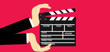 Regieklappe auf rotem Hintergrund